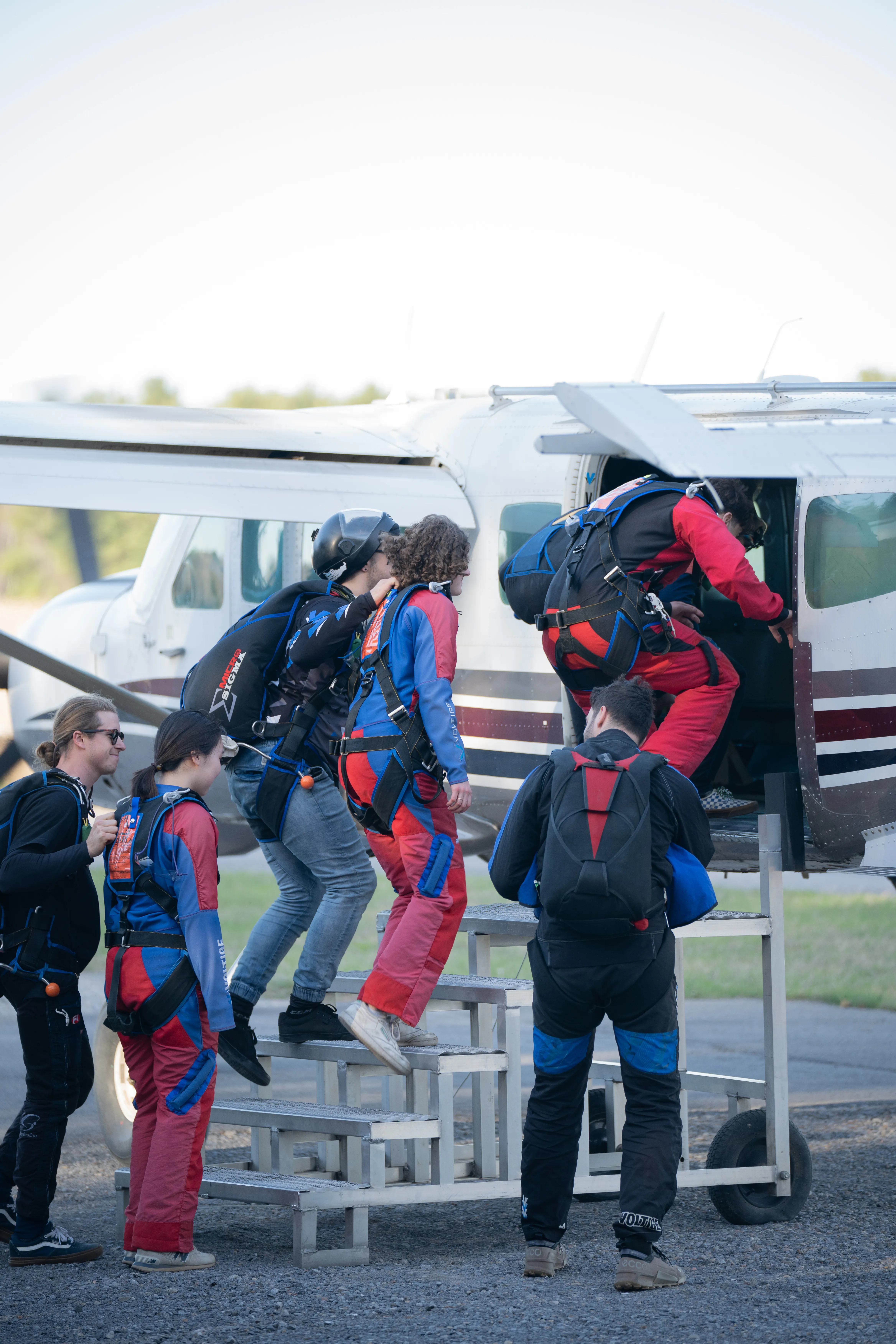 skydiving students entering a plane